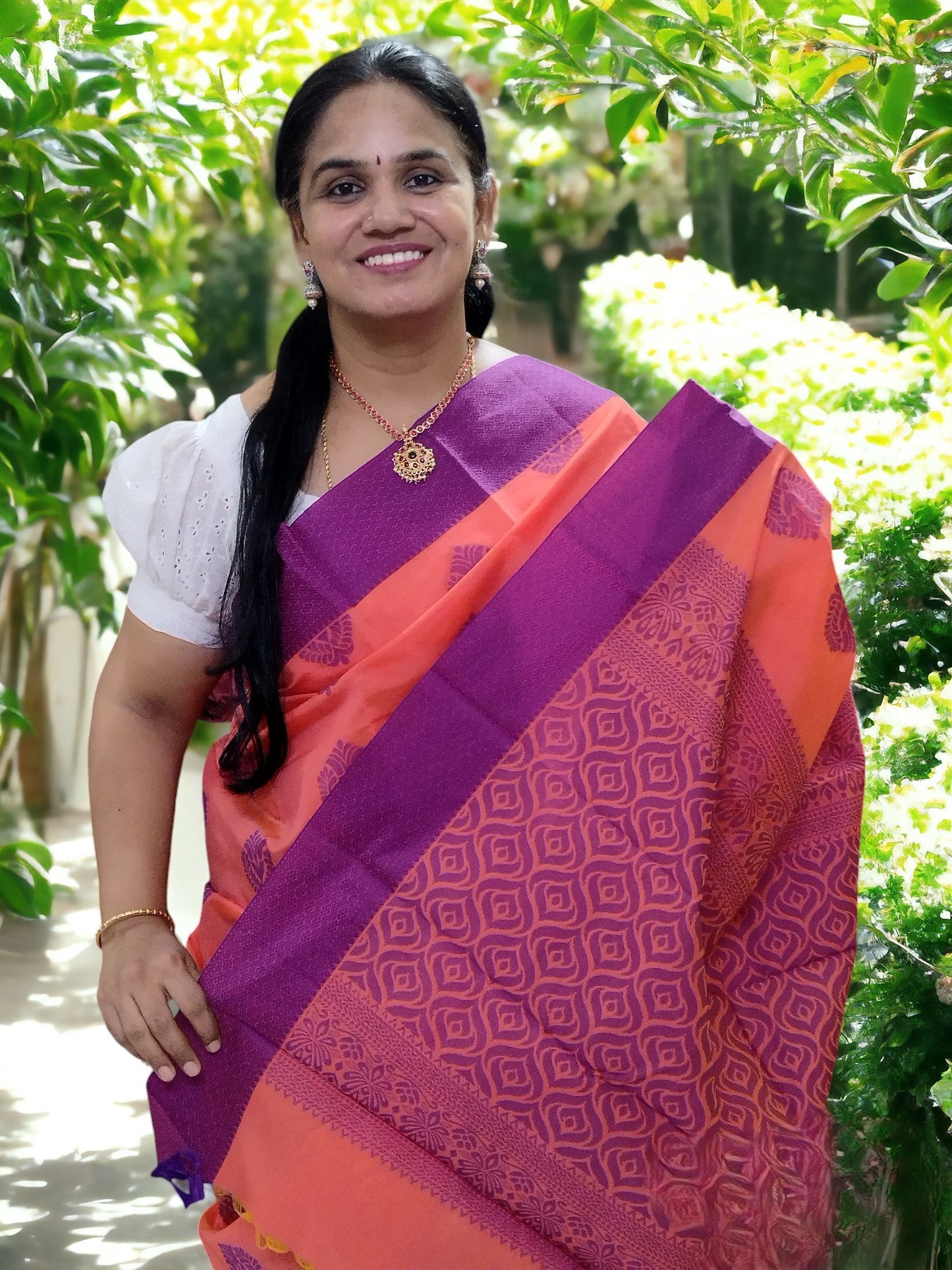 Orange with with purple contrast border kanchi cotton saree