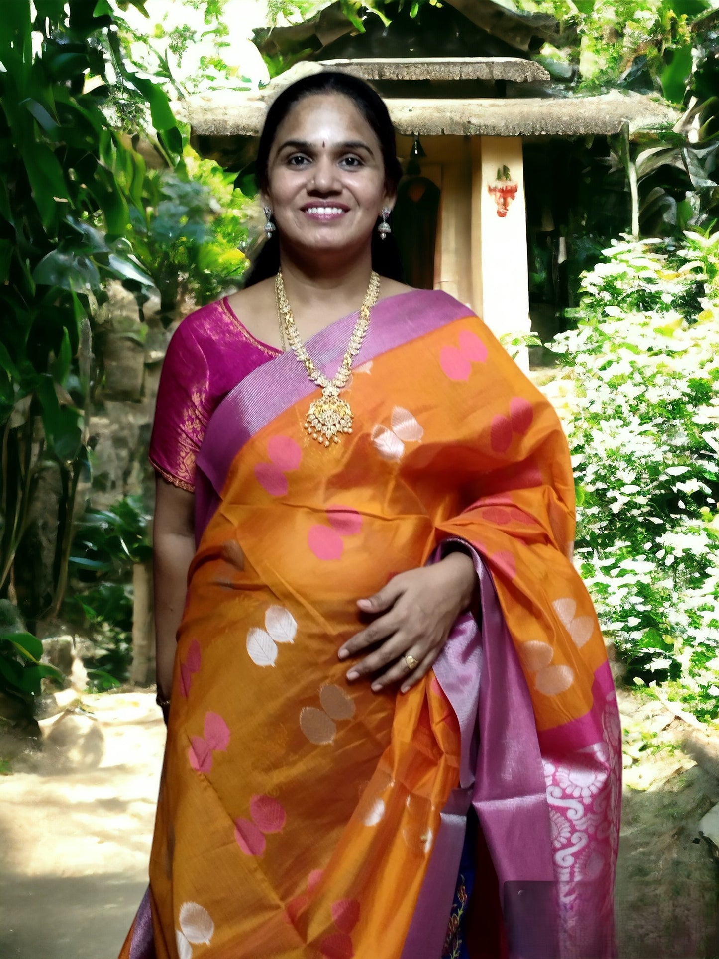 Orange and pink zari border Kanchi semi silk cotton