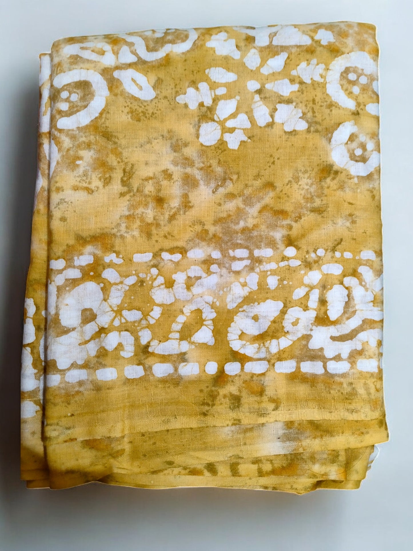 Mustard yellow batik printed saree
