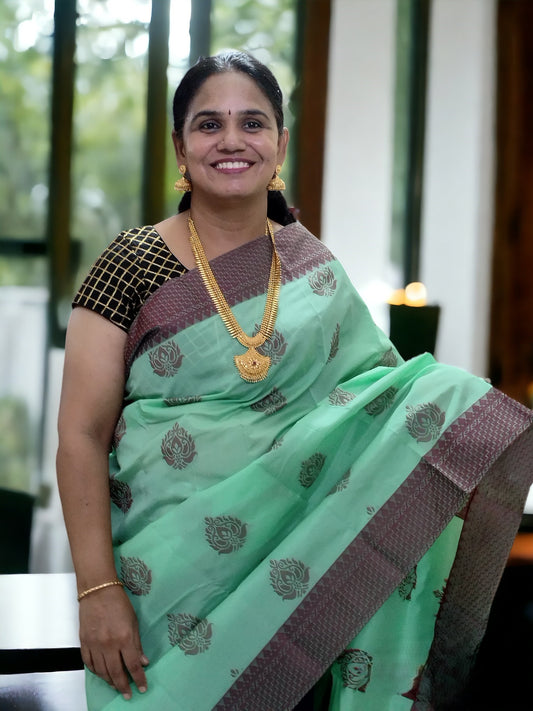 Pista green with contrast maroon border Kanchi cotton
