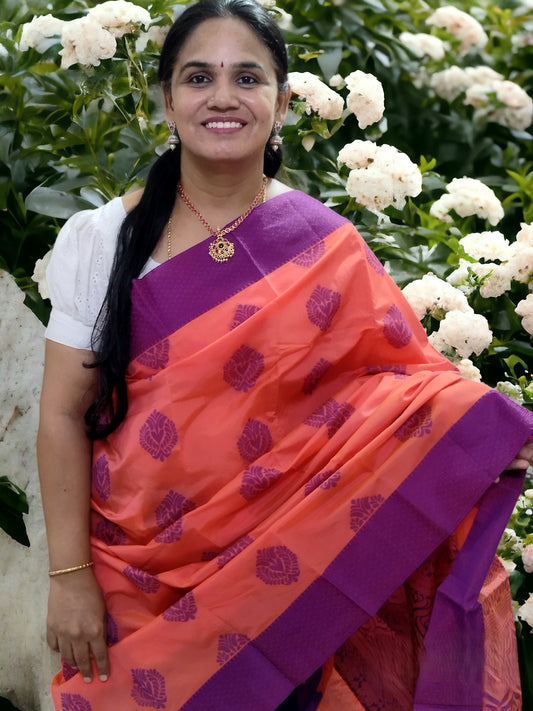 Orange with with purple contrast border kanchi cotton saree